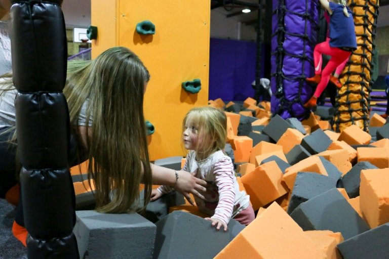 mum and daughter having fun in one of our foam pits
